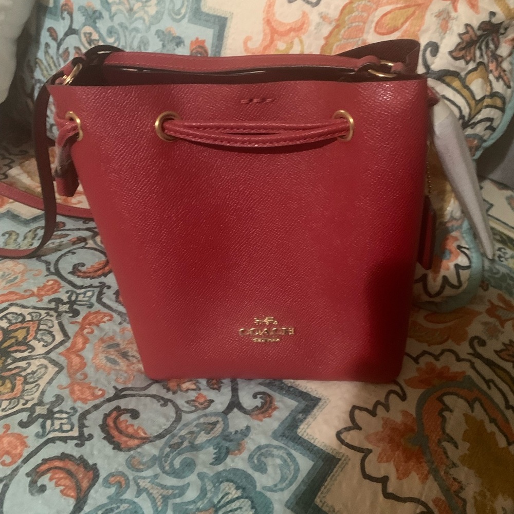 Brand new crossbody Coach bag.